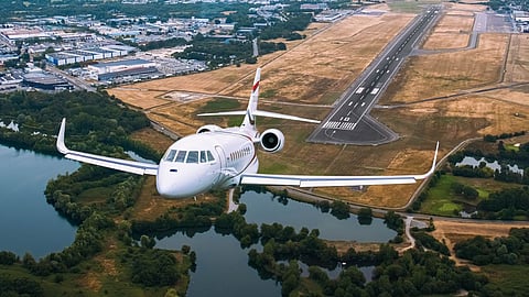 Falcon 2000LXS taking off from a airfield