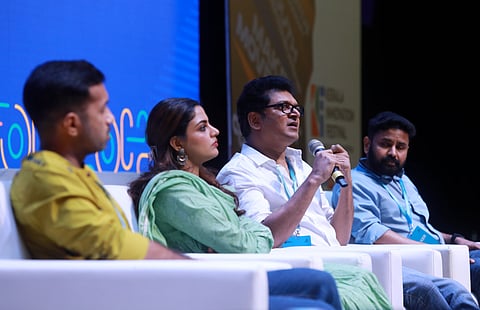 Sanjay Cherian, Sanjay-Bobby, fame, speaking at the the summit 'Today's Cinema: From script to screen' at the Kerala Innovation Festival at Kochi on Saturday. Actress Nikhila Vimal, filmmaker Christo Tommy and film producer T R Shamsudheen are also seen.