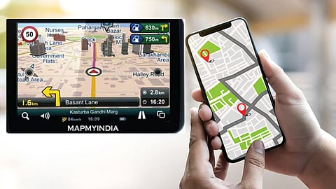 MapmyIndia GPS navigation screen beside a smartphone map with red location pins.