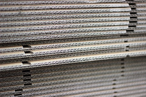 paper boxes stacked vertically
