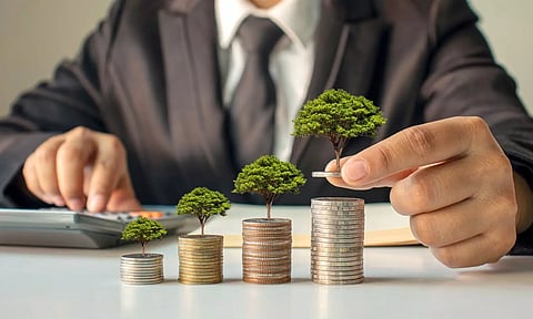 Man counting invested coins