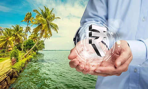 Rupee in hands, Kerala backwaters