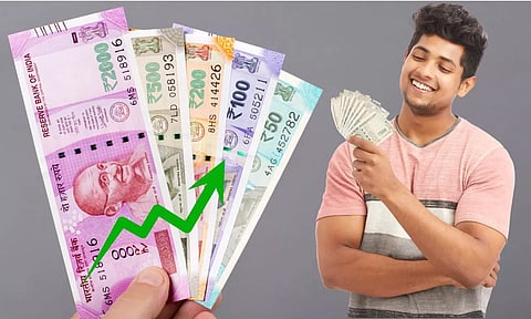 Indian Rupee notes in hand