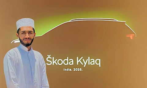 siyad muhammed winner of naming campaign of skoda new car with new name skoda kylaq banner in the background