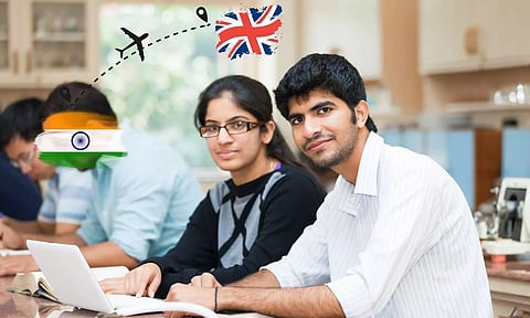 two students in library with indian and uk flag