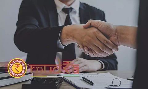 banking staff giving loans mudra symbol