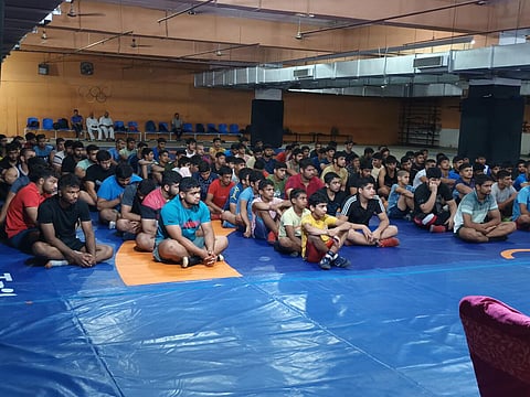 Budding wrestlers during a training session at the Chhatrasal Akhada. 