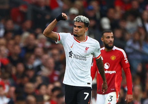 Luis Diaz celebrates scoring Liverpool’s second goal during his team’s 3-0 win over Manchester United at Old Traffordon Sunday. REUTERS
