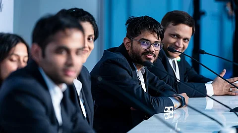 Indian team's non-playing captain and coach Srinath Narayanan (second from right) at the press conference after India's triumph.