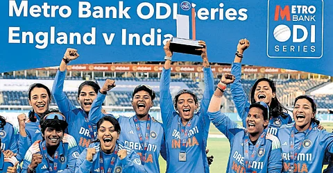 India’s Harmanpreet Kaur lifts the trophy as she celebrates with teammates the ODI series win over England in Chester-Le-Street on Tuesday night.