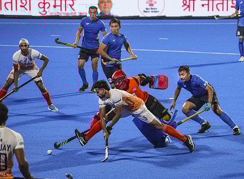 India’s Abhishek (centre) tries to score during India’s comprehensive 15-0 victory over Kazakhstan in the men’s Asia Cup in Rajgir, Bihar on Monday. PTI