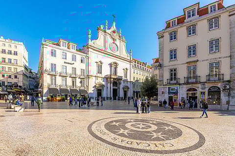What makes Portugal's streets feel like a patterned carpet?