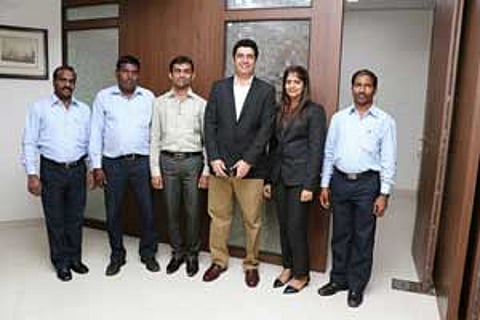 Nirav Shah (3rd from Left) and Sharookh Kocheck (3rd from right)