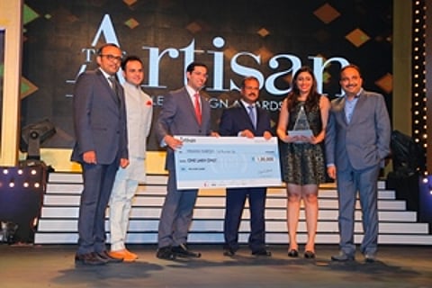 Mr. Jitender Jain, CEO Entice with Ms. Himani Harish Designer receiving the award in Outstanding Jewellery Manufacturer catagory (Artisan Jewellery Design Awards 2014-15)