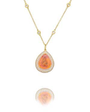Orange sapphire and diamond pendant made in 18K yellow gold