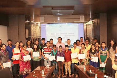 Kiran Gems' Director, Dinesh Lakhani, with Scholarship Winners At Future Achiever's Scholarship Programme 2015 Organised By The Diamantaire