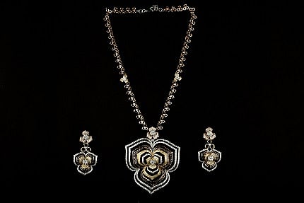 Mesmeric Charm Set by Bawa Jewellers