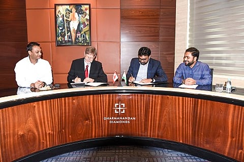 Agreement was signed at Dharmanandan Diamonds Pvt. Ltd. in Surat, India. (l to r) Vipul Sutariya, Hitesh Patel, MD, DDPL, Mike Botha, Shailesh Patel