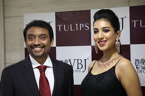 Jithendra Vummidi, Managing Partner, Vummidi Bangaru Jewellers along with Chennai model Ashwini Kumar adorning the recently launched collection, ‘Tulips’