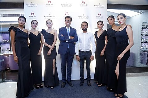 Mr. Tilak Tholasi, Managing Partner, Tholasi Jewels and Mr. Sachin Jain, President, Forevermark India with models at an exclusively launch of Forevermark at Tholasi Jewels in Mysuru