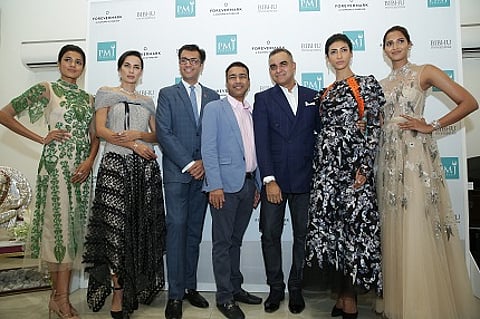 Mr. Sachin Jain, President Forevermark India along with Mr. Dinesh Jain, M.D., PMJ Jewels and Mr. Bibhu Mohapatra at the launch of Forevermark Artemis Collection