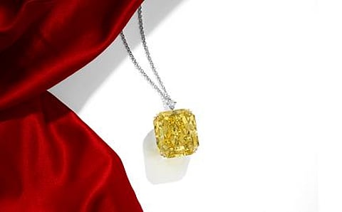 AN IMPORTANT FANCY VIVID YELLOW DIAMOND PENDANT OF 70.19 carats Price realized: $2,850,000