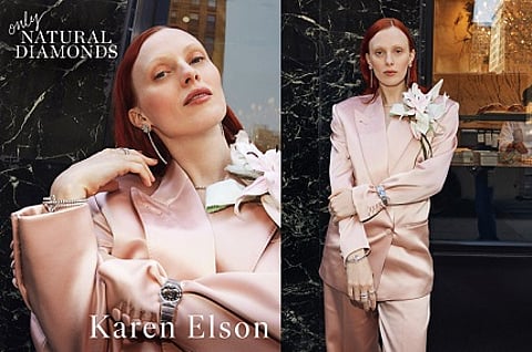 Karen Elson stars in the Spring 22 Only Natural Diamonds digital cover wearing diamond jewelry by Bulgari (earrings and bracelet) London Jewelers (necklace), and Omega (watch); coat by Gucci