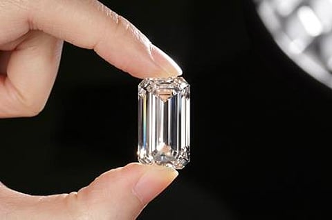 This 34.59 ct CVD-grown diamond (24.94 × 13.95 × 9.39 mm), produced by the Ethereal Green Diamond in India, is the largest seen by GIA. Photo by Johnny (Chak Wan) Leung (GIA).