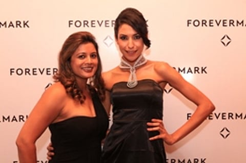 Designer Reena Ahluwalia with model wearing her jewellery creation
