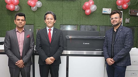 Mr. Manabu Yamazaki (Centre), President and CEO, Canon India Pvt. Ltd. along with Mr. Himanshu Dhall (left) and Mr. Sidhanshu Dhall(Right) of Wee Print, Patparganj, Delhi