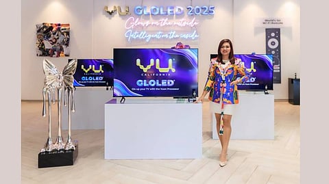 (Vu Chairman and CEO, Devita Saraf with the latest range of Vu GloLED TVs)