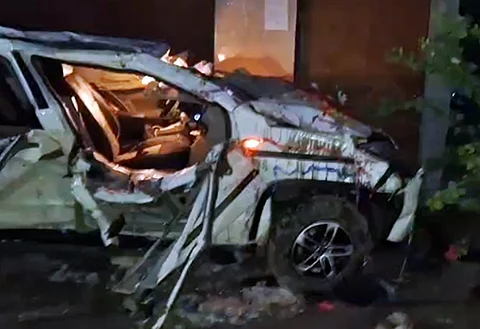 SUV collides with wall