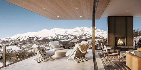 A private terrace overlooking snow-covered peaks offers a serene mountain escape at Four Seasons Resort and Private Residences Telluride
