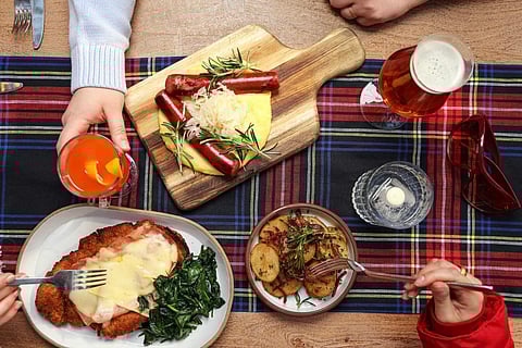 Tablescape of dishes at Alpina Pop Up Restaurant. Photo Courtesy of Eataly
