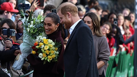 Harry e Meghan, duques de Sussex, à chegada ao Community Recording Studio, em Nottingham, no Reino Unido, esta quinta-feira, 15 de outubro.