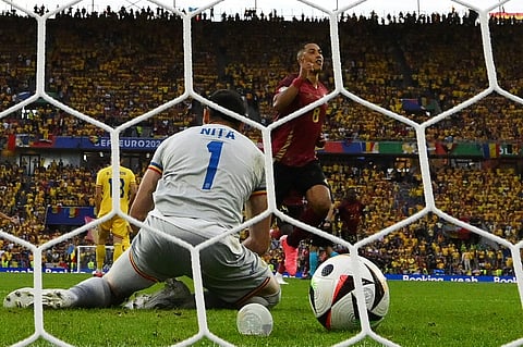 Bélgica vence Roménia e sobrevive num grupo cheio de emoção