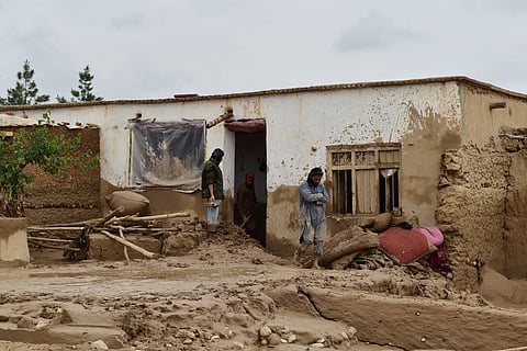 As cheias destruíram casas e culturas, no Afeganistão.