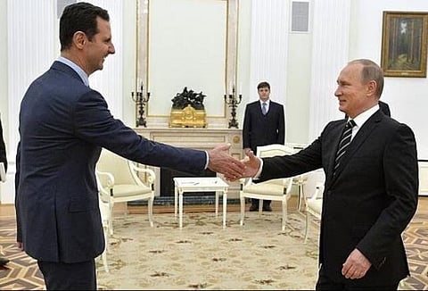 Assad e Putin durante uma visita do ex-presidente da Síria a Moscovo