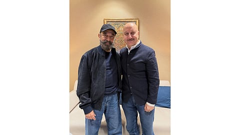 Kamal Hassan with Anupam Kher at the Mumbai airport (Photo: IANS)