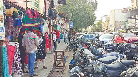 Vendors on the pavement, and haphazard parking make it unsafe for pedestrians