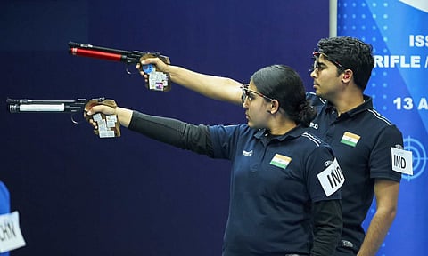 Suruchi Singh takes aim with Saurabh Chaudhary at a championship