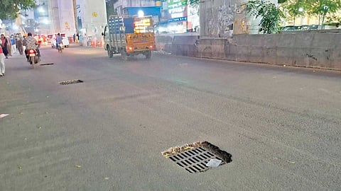 Storm water drain pits are right in the middle of Arcot Road
