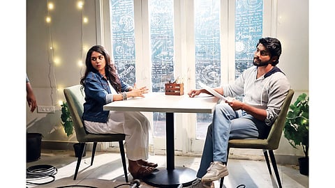 Tharshan and Alisha Mirani skim through the scene paper