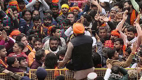 Vishwa Hindu Parishad (VHP) and Bajrang Dal members hold a protest outside the Bangladesh High Commission over attacks on Hindus in the neighbouring country, in New Delhi, Tuesday, Dec. 23, 2025.