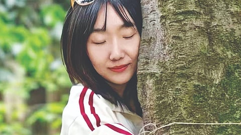 Urban Healing: Why so many young Beijingers are hugging trees