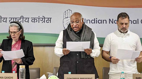 Congress President Mallikarjun Kharge with LoP in the Lok Sabha and party leader Rahul Gandhi and party MP Sonia Gandhi takes an oath during the Congress Working Committee (CWC) meeting, at Indira Bhawan, in New Delhi