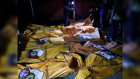 Body bags containing the victims from the fire in Manado, Indonesia