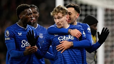 Everton's James Garner celebrating after scoring a goal