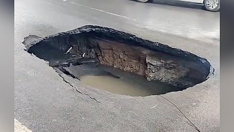 Screengrab of the video showcasing the cave-in of a part of RK Mutt Road on Thursday