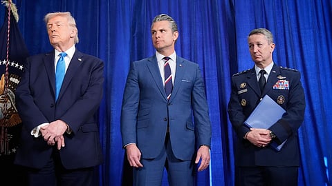 President Donald Trump, Defense Secretary Pete Hegseth and Chairman of the Joint Chiefs of Staff Gen. Dan Caine listen as Secretary of State Marco Rubio speaks during a news conference at Mar-a-Lago.